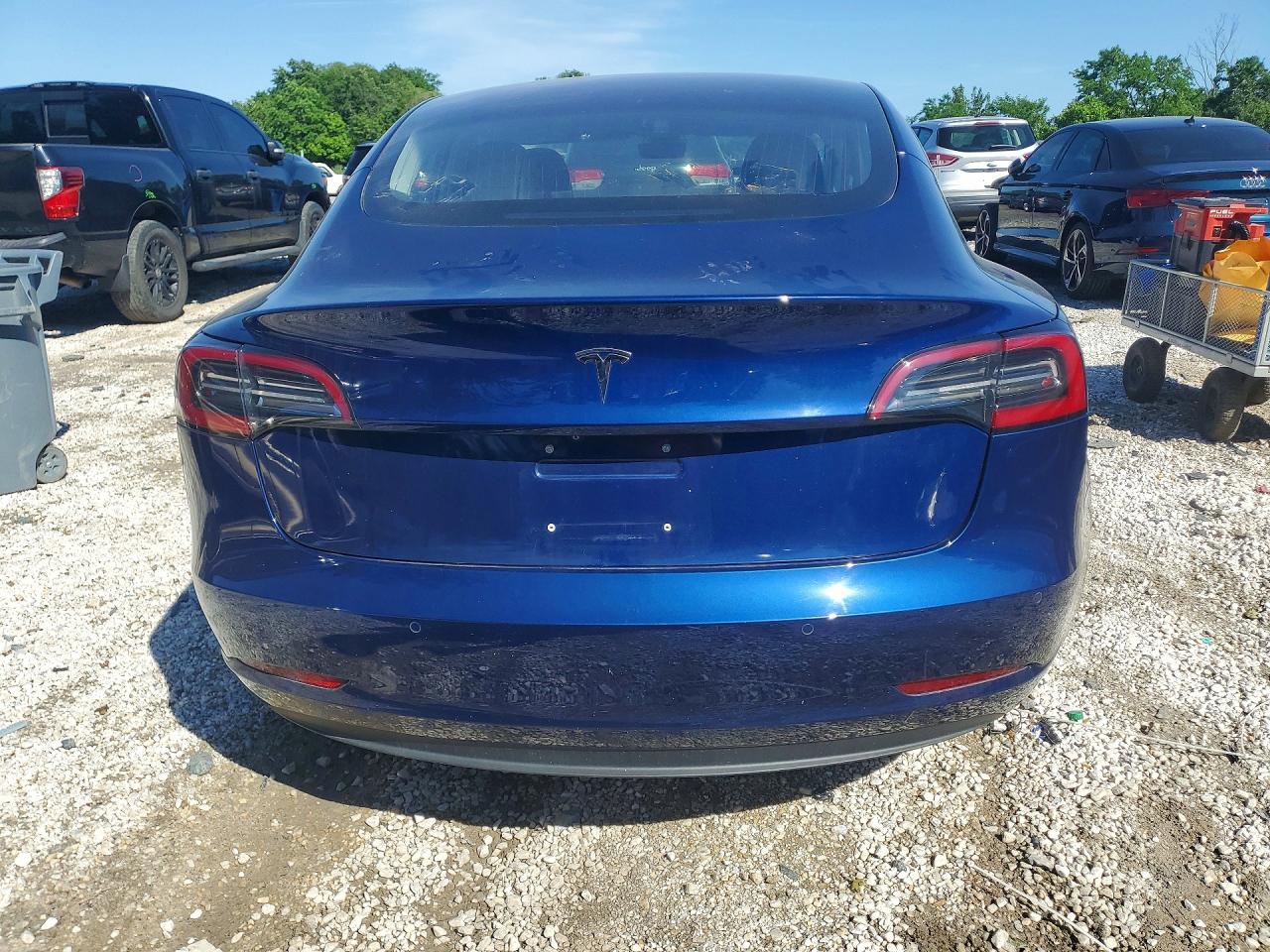 2018 Tesla Model 3 VIN 5YJ3E1EA6JF017006 COPART salvage auction — Side, MD - CERTIFICATE OF TITLE (P), sold $5,900 on 2026-07-03 (photo 6)