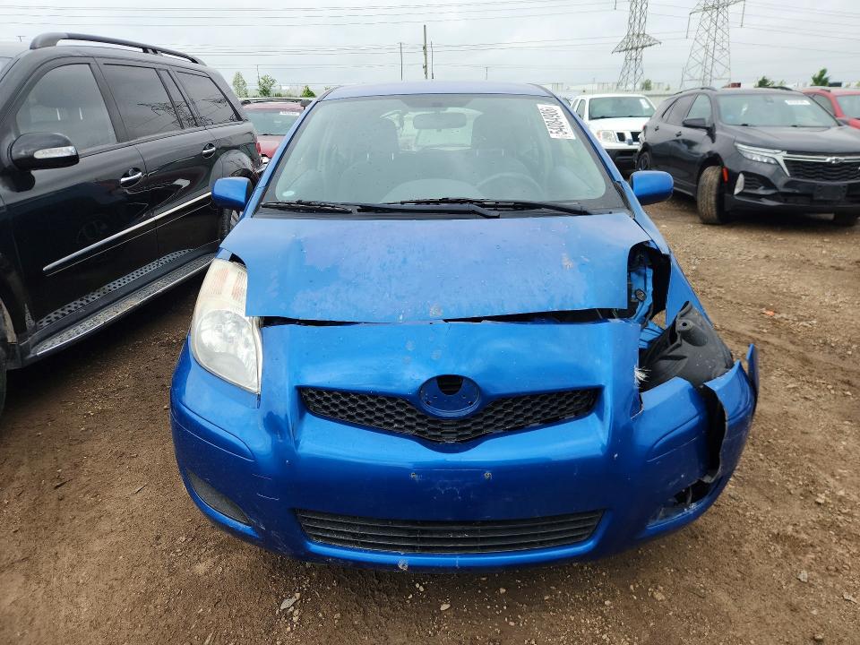 2011 Toyota Yaris VIN JTDJT4K39B5335256 COPART salvage auction — FRONT END, Il - Salvage Certificate, sold $775 on 2026-07-07 (photo 5)