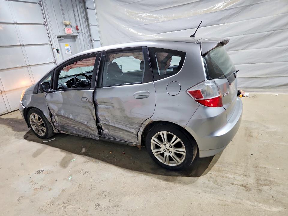 2009 Honda Fit VIN JHMGE88459S029435 COPART salvage auction — SIDE, Nh - Cert Of Title-Salvage, sold $100 on 2026-07-28 (photo 2)