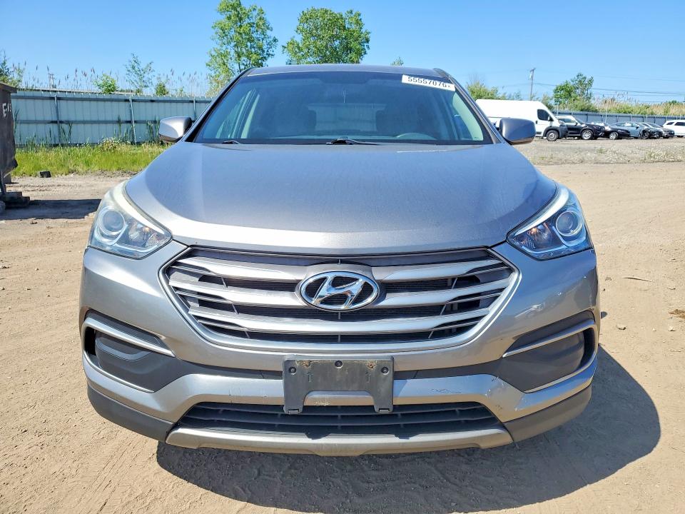 2018 Hyundai Santa fe VIN 5NMZTDLB0JH065547 COPART salvage auction — MINOR DENT/SCRATCHES, Oh - Certificate Of Title, sold $2,500 on 2026-07-02 (photo 5)