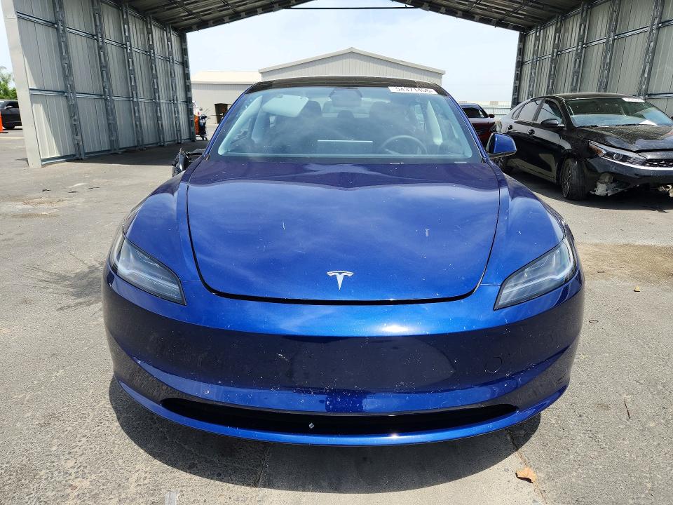 2025 Tesla Model 3 VIN 5YJ3E1EA4SF057005 COPART salvage auction — SIDE, Ca - Salvage Certificate, sold $11,300 on 2026-07-13 (photo 5)