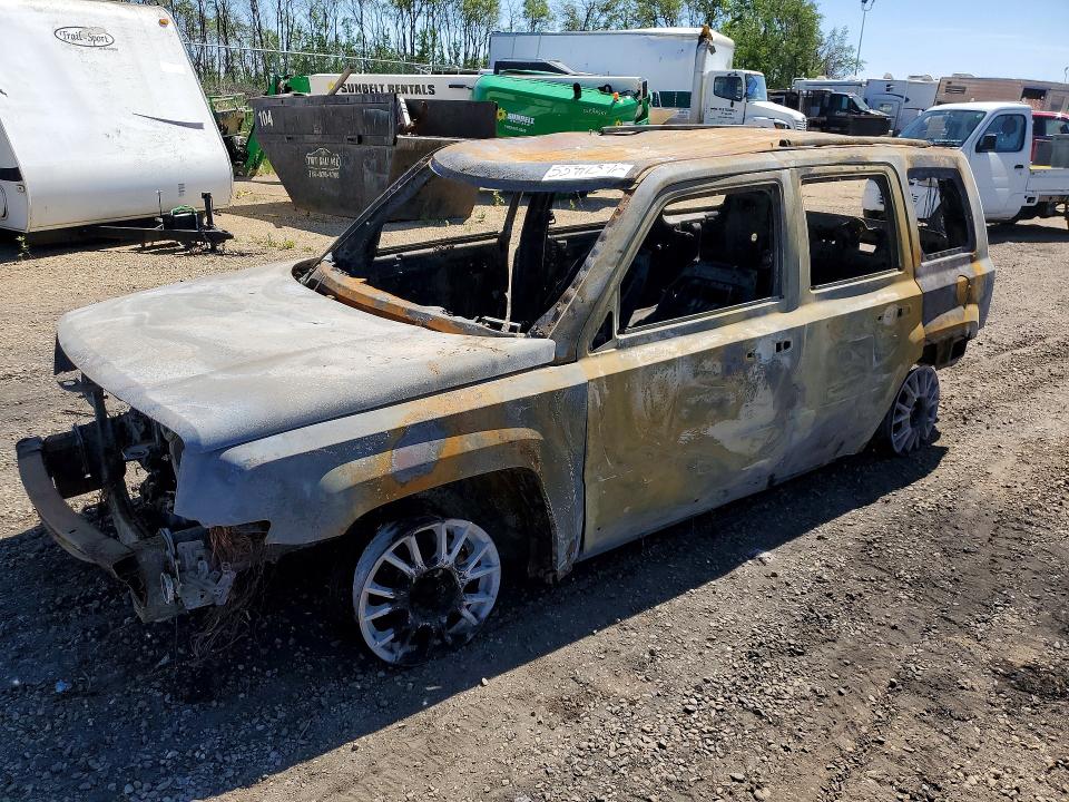 2014 Jeep Patriot VIN 1C4NJRAB0ED518973 COPART salvage auction — BURN, Ab - Bos - Nonrepairable, sold $50 on 2026-07-09 (photo 1)