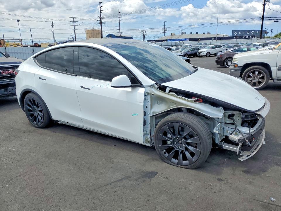 2023 Tesla Model y VIN 7SAYGDEE0PA071687 COPART salvage auction — FRONT END, Salvage Title, sold $12,200 on 2026-07-22 (photo 4)