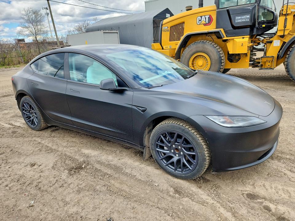 2024 Tesla Model 3 VIN LRW3E7FA8RC105935 COPART salvage auction — REAR END, Qc - Aucune Mention, sold $11,400 on 2026-07-28 (photo 4)