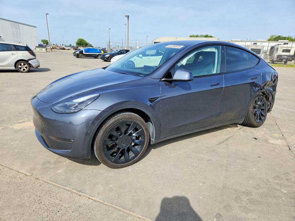 2022 Tesla Model y VIN 7SAYGDEE9NF569774 COPART salvage auction — REAR END, CA - SALVAGE CERTIFICATE, sold $11,400 on 2026-07-06 (photo 1)