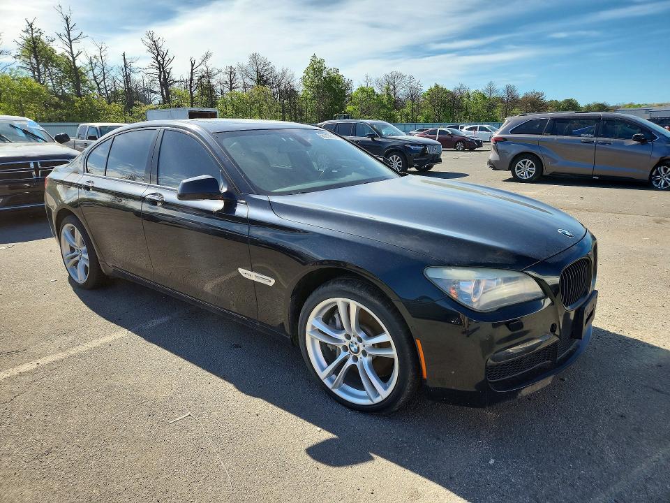 2012 BMW 7 series VIN WBAKC6C55CDX99486 COPART salvage auction — MINOR DENT/SCRATCHES, Oh - Certificate Of Title, sold $1,450 on 2026-07-15 (photo 4)