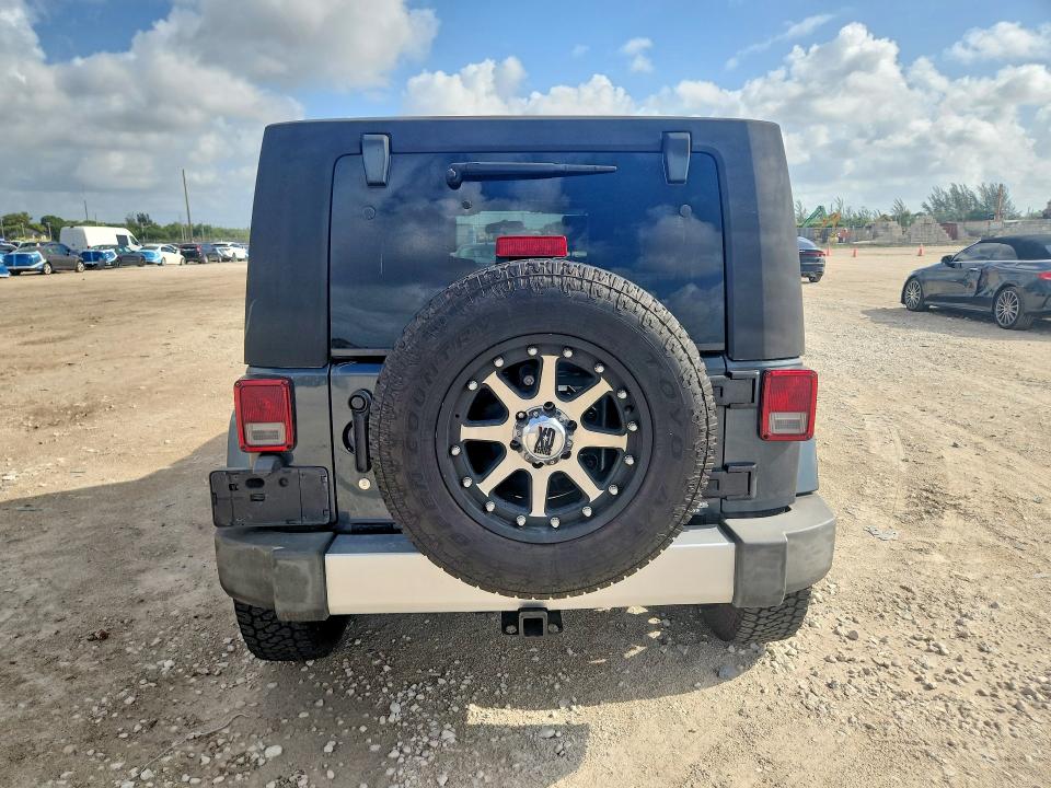 2008 Jeep Wrangler / VIN 1J4GA59118L595689 COPART salvage auction — FRONT END, Fl - Cert Of Title Slvg Rebuildable, sold $2,700 on 2026-08-04 (photo 6)