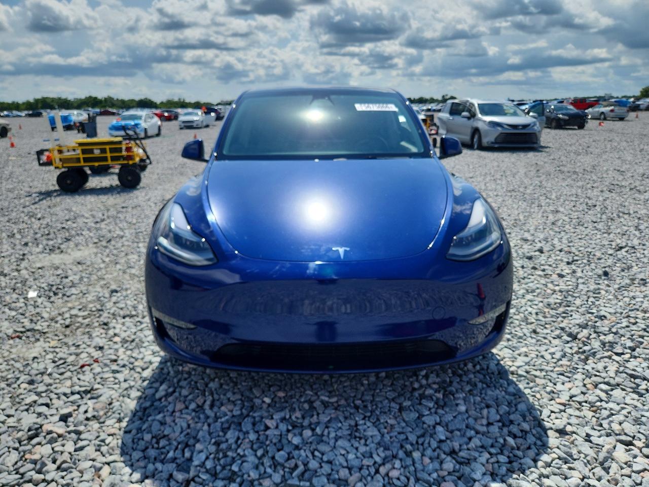 2022 Tesla Model Y VIN 7SAYGDEF3NF372818 COPART salvage auction — Rear End, FL - CERT OF TITLE SLVG REBUILDABLE, sold $12,500 on 2026-07-03 (photo 5)