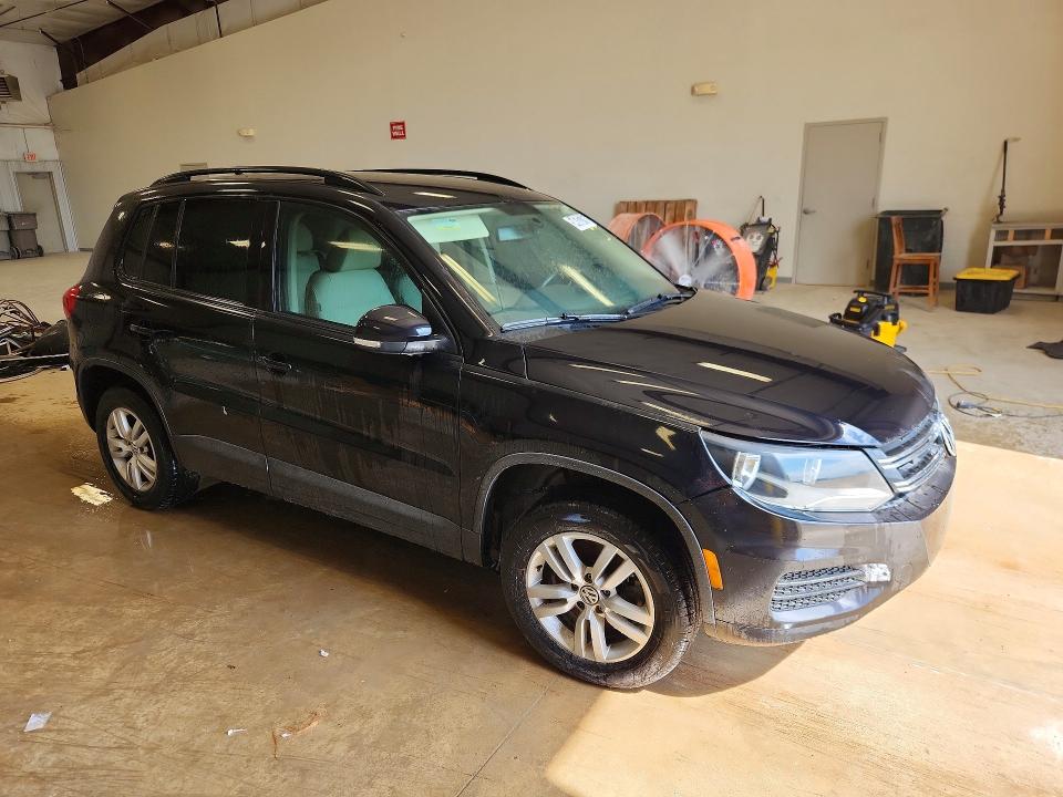 2017 Volkswagen Tiguan VIN WVGAV7AXXHK016745 COPART salvage auction — MINOR DENT/SCRATCHES, Tx - Certificate Of Title, sold $600 on 2026-07-07 (photo 4)