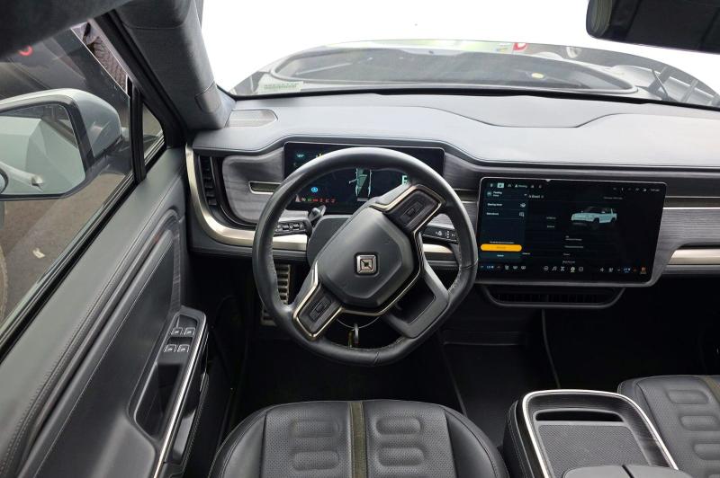 2023 Rivian R1s VIN 7PDSGABA4PN019950 COPART salvage auction — Normal Wear, MA - CERT OF TITLE-SALVAGE (P), sold $43,500 on 2026-06-08 (photo 9)