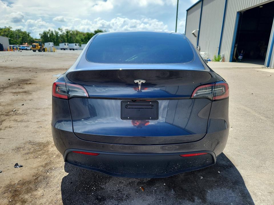 2025 Tesla Model y VIN 7SAYGDED5SA372181 COPART salvage auction — FRONT END, Fl - Certificate Of Destruction, sold $9,500 on 2026-07-20 (photo 6)