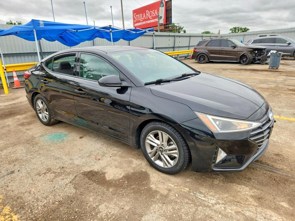 2019 Hyundai Elantra VIN KMHD84LF1KU730377 COPART salvage auction — VANDALISM, KS - CERT OF TITLE-SALVAGE, sold $2,700 on 2026-07-15 (photo 4)