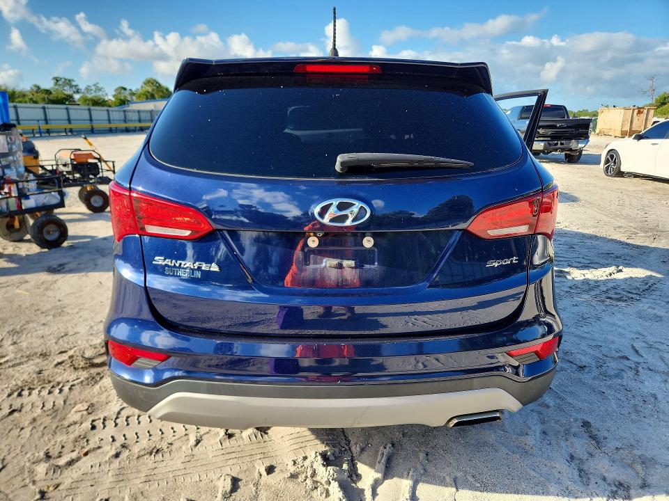 2018 Hyundai Santa fe VIN 5XYZT3LB7JG565743 COPART salvage auction — WATER/FLOOD, Fl - Cert Of Title-Slvg Rebld Flood, sold $3,650 on 2026-07-08 (photo 6)