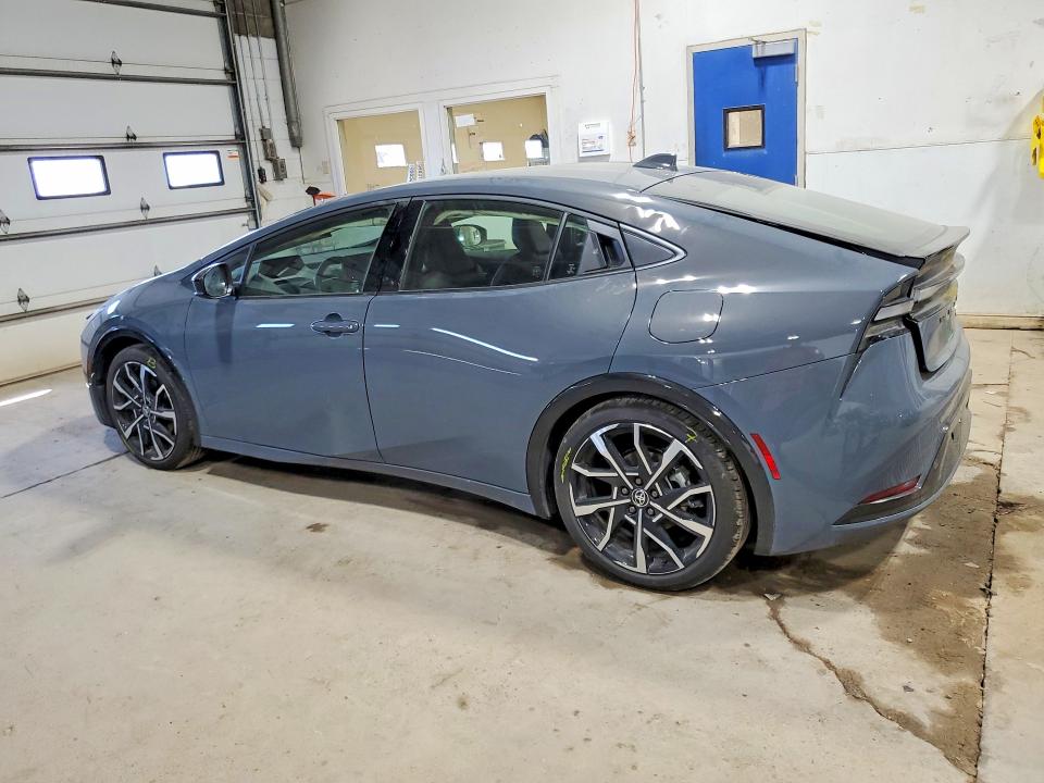 2025 Toyota Prius VIN JTDACACU0S3049264 COPART salvage auction — SIDE, Mn - Cert Of Title-Salvage, sold $9,700 on 2026-07-07 (photo 2)