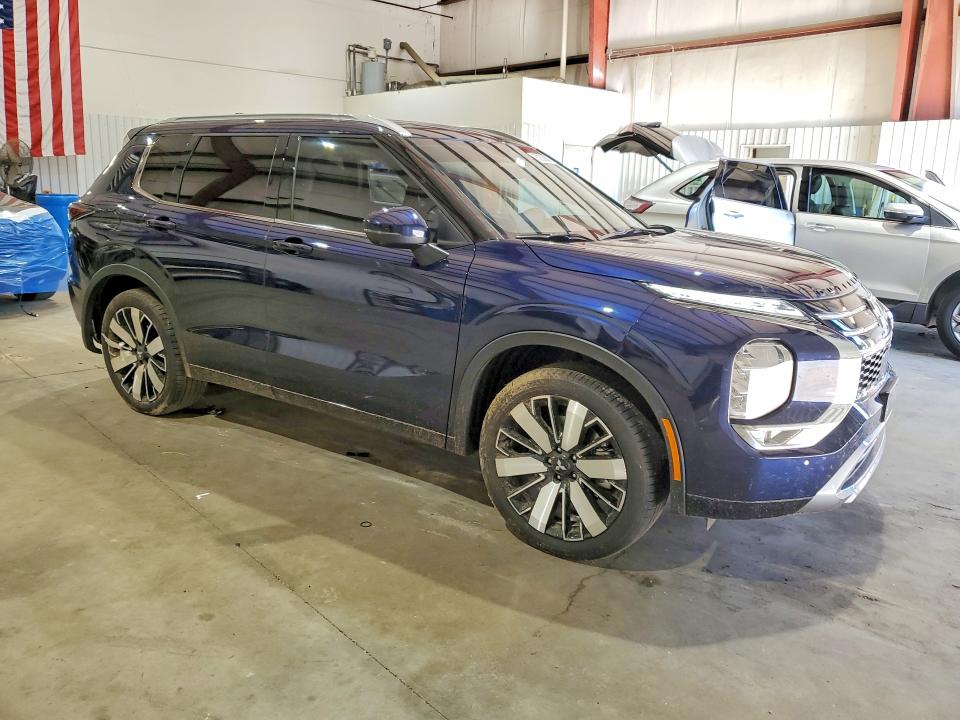 2025 Mitsubishi Outlander VIN JA4J3WA8XSZ057057 COPART salvage auction — SIDE, TX - SALVAGE VEHICLE TITLE, sold $8,400 on 2026-07-13 (photo 4)