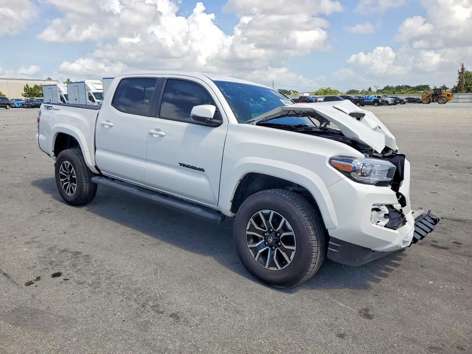 2023 Toyota Tacoma VIN 3TMAZ5CNXPM207940 COPART salvage auction — FRONT END, FL - CERTIFICATE OF TITLE (P), sold $16,000 on 2026-07-31 (photo 4)