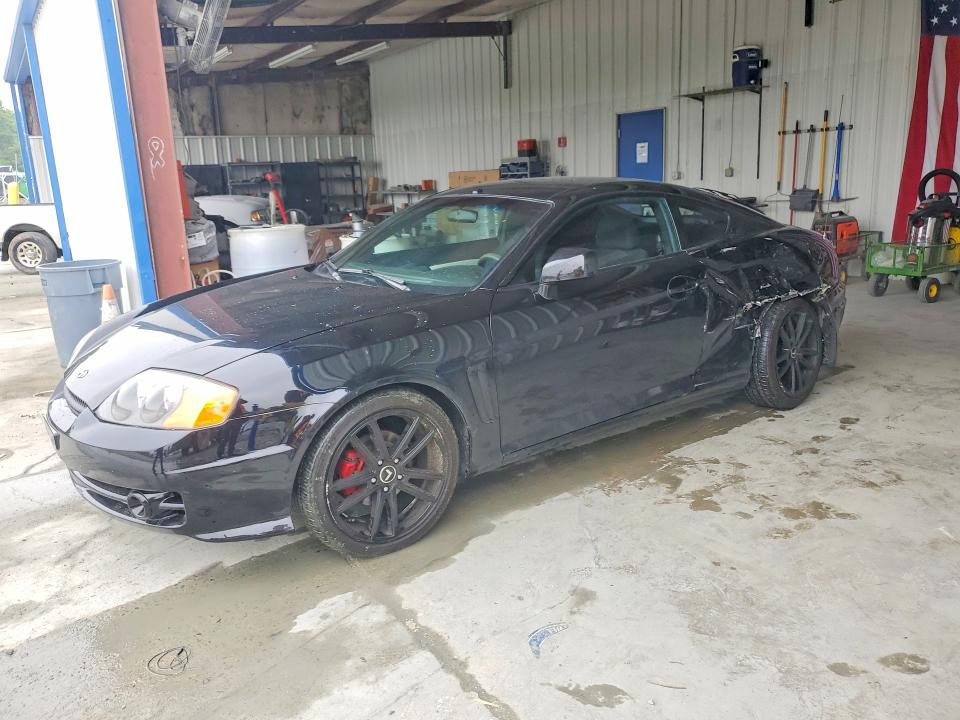 2004 Hyundai Tiburon VIN KMHHM65D04U107498 COPART salvage auction — SIDE, Nc - Salvage Certificate Of Title, sold $200 on 2026-07-08 (photo 1)