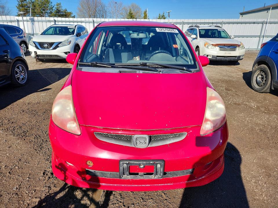 2007 Honda Fit VIN JHMGD38687S819235 COPART salvage auction — SIDE, On - Permit Rebuilt - Unfit, sold $375 on 2026-07-28 (photo 5)