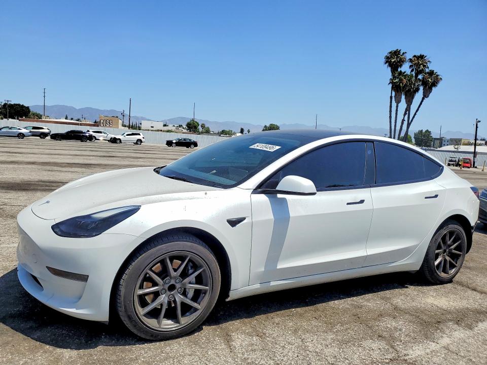 2023 Tesla Model 3 VIN 5YJ3E1EA2PF587769 — COPART salvage auction photo