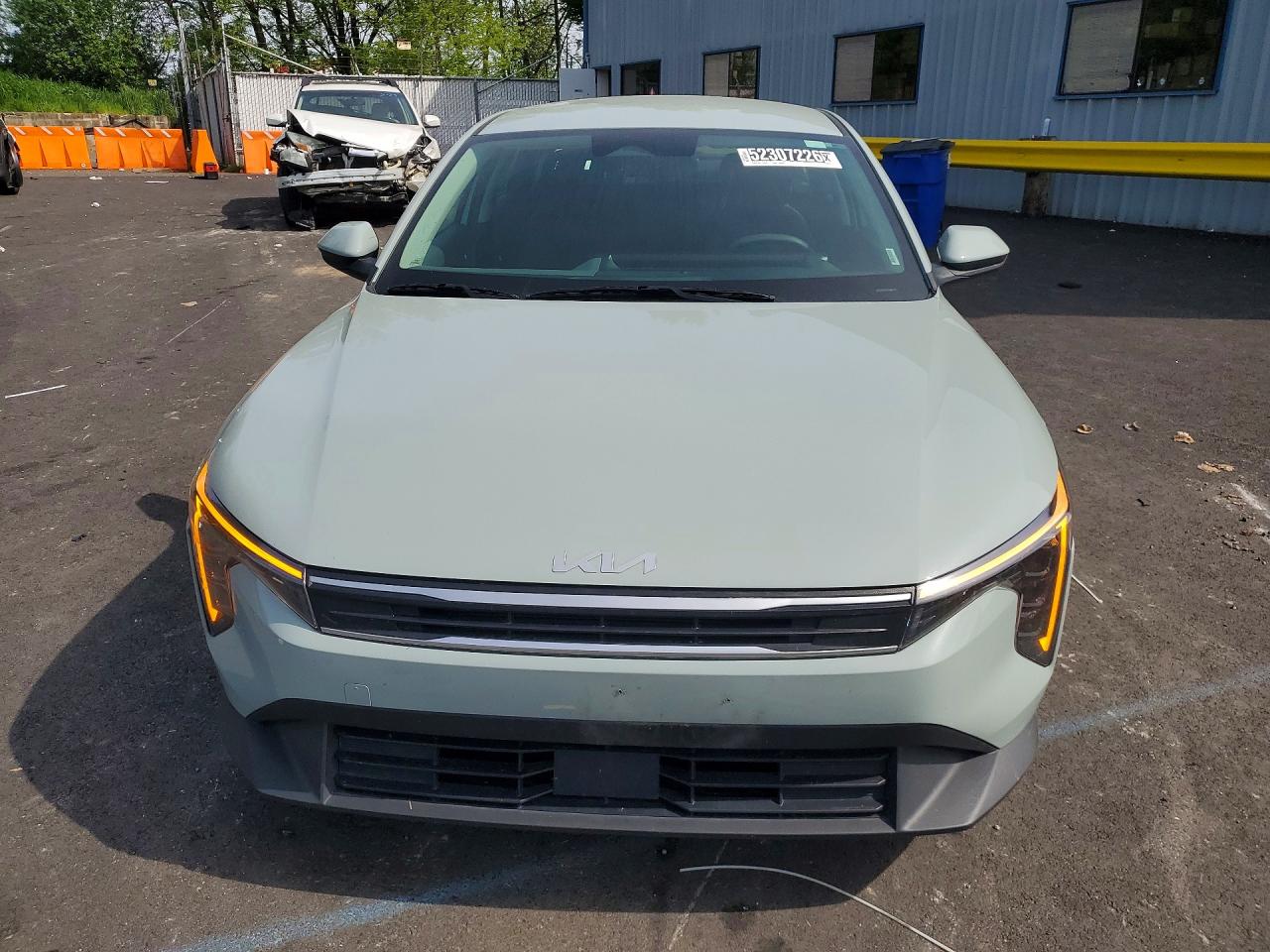 2025 Kia K4 VIN 3KPFT4DE6SE068442 COPART salvage auction — Side, OR - SALVAGE TITLE CERTIFICATE, sold $6,000 on 2026-06-24 (photo 5)