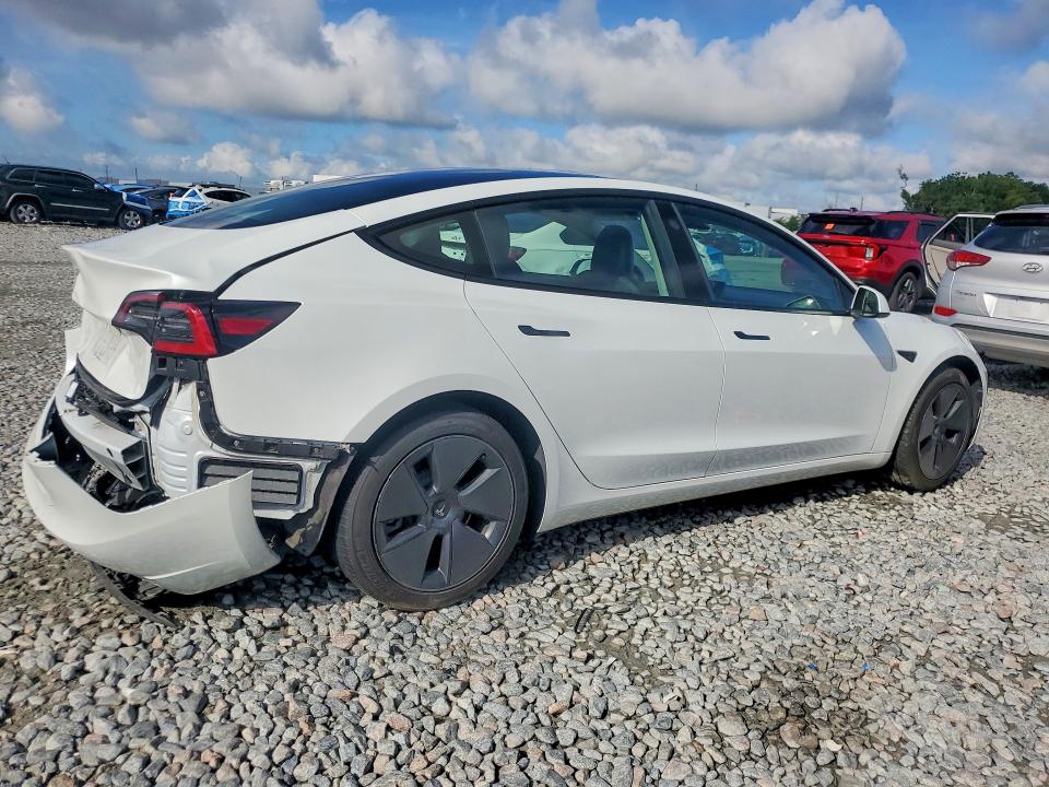 2023 Tesla Model 3 VIN 5YJ3E1EA4PF410737 COPART salvage auction — REAR END, Fl - Cert Of Title Slvg Rebuildable, sold $9,300 on 2026-07-13 (photo 3)