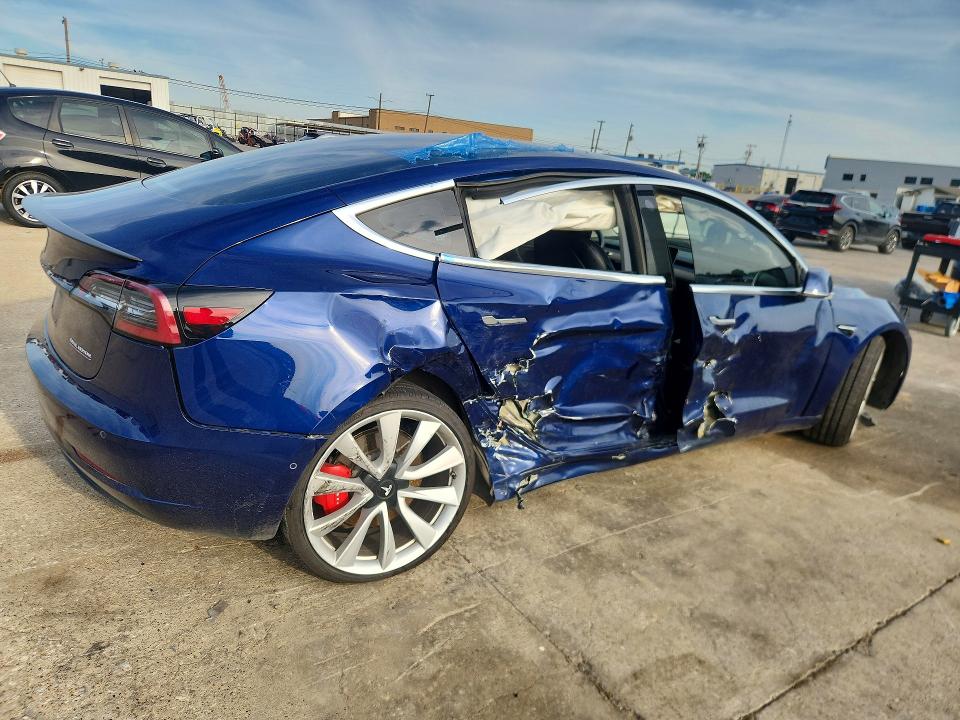 2018 Tesla VIN 5YJ3E1EB2JF106340 COPART salvage auction — SIDE, Tx - Salvage Vehicle Title, sold $4,850 on 2026-07-16 (photo 3)