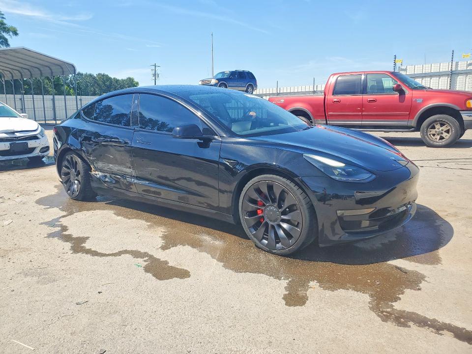 2022 Tesla Model 3 VIN 5YJ3E1EC6NF262413 COPART salvage auction — SIDE, Sc - Cert Of Title-Salvage, sold $12,600 on 2026-07-13 (photo 4)