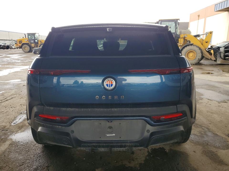 2023 Fisker Ocean VIN VCF1UBU20PG007550 COPART salvage auction — MINOR DENT/SCRATCHES, In - Certificate Of Title, sold $10,900 on 2026-08-13 (photo 6)