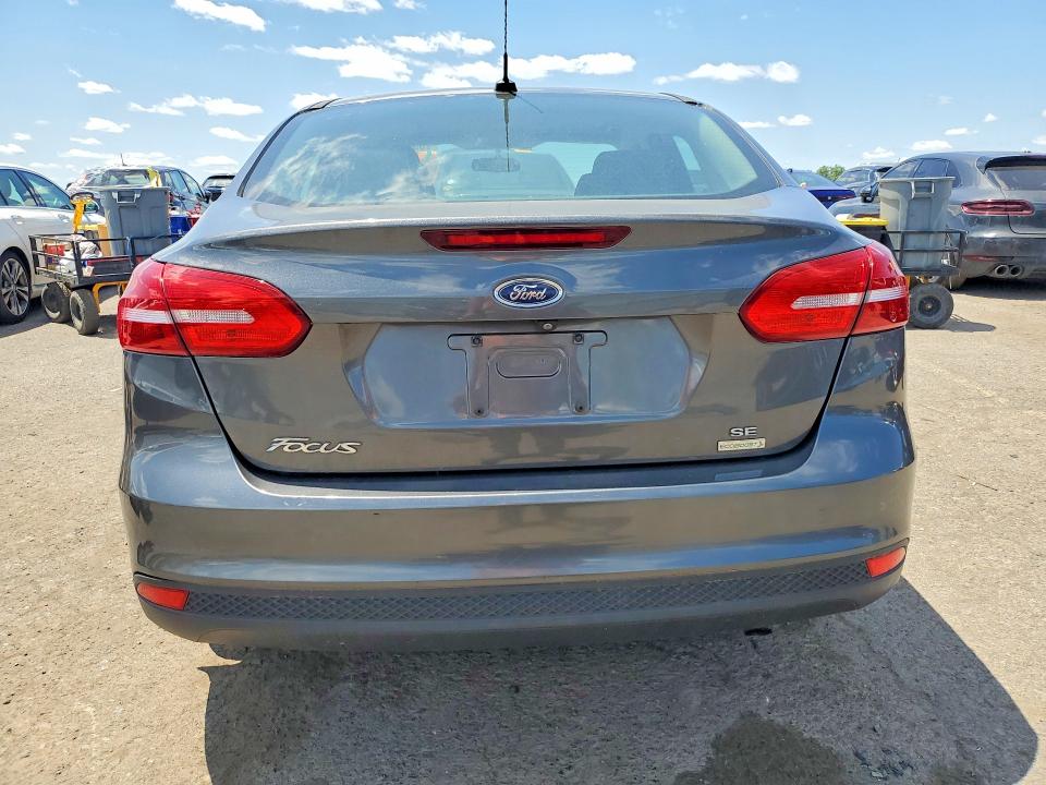2018 Ford Focus VIN 1FADP3FE3JL226055 COPART salvage auction — MINOR DENT/SCRATCHES, Pa - Cert Of Title, sold $1,200 on 2026-07-23 (photo 6)
