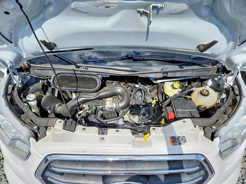 2020 Ford VIN 1FBAX2C80LKB49034 COPART salvage auction — SIDE, Fl - Certificate Of Destruction, sold $3,250 on 2026-07-09 (photo 7)