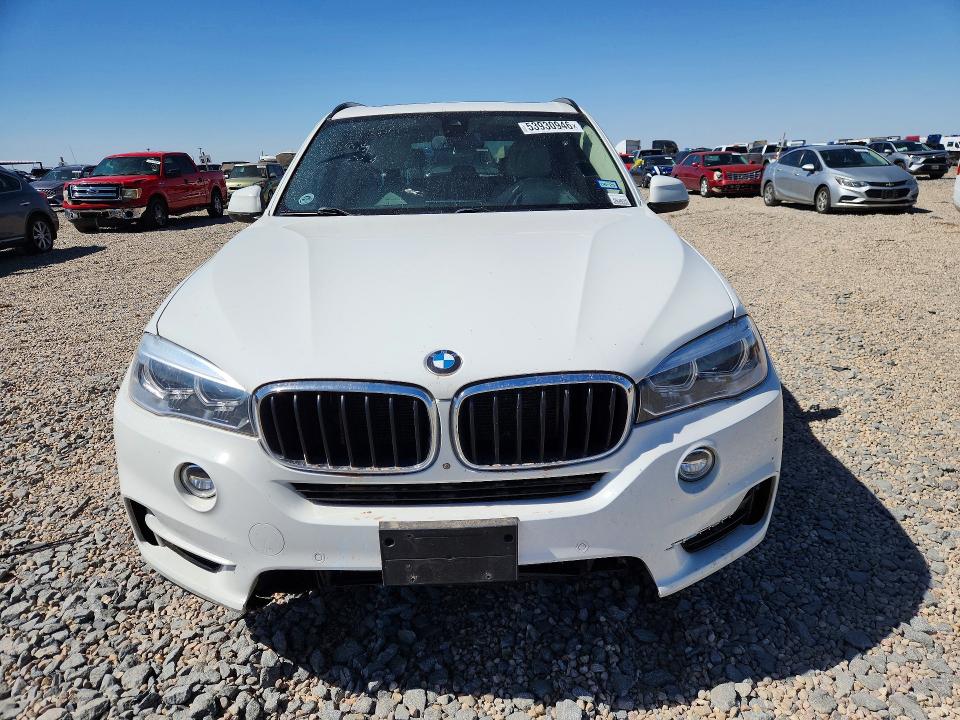 2014 BMW X5 VIN 5UXKR2C52E0H31314 COPART salvage auction — MINOR DENT/SCRATCHES, Tx - Certificate Of Title, sold $3,250 on 2026-07-07 (photo 5)