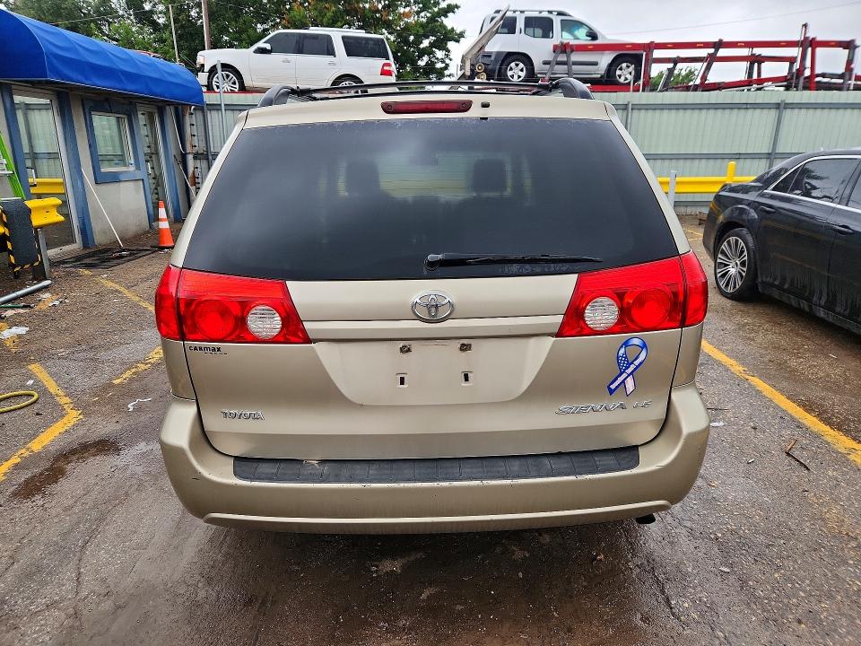 2010 Toyota Sienna VIN 5TDKK4CC2AS313565 COPART salvage auction — FRONT END, KS - DUPLICATE TITLE, sold $725 on 2026-07-20 (photo 6)