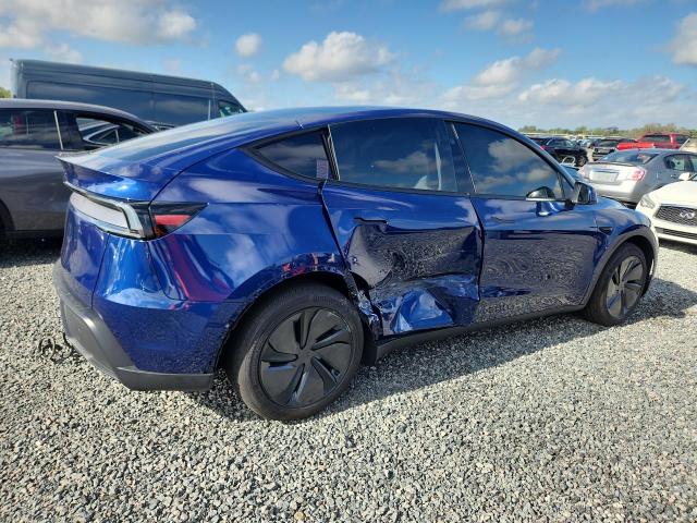 2026 Tesla Model y VIN 7SAYGDED5TF524612 COPART salvage auction — SIDE, Fl - Cert Of Title Slvg Rebuildable, sold $22,300 on 2026-07-10 (photo 3)