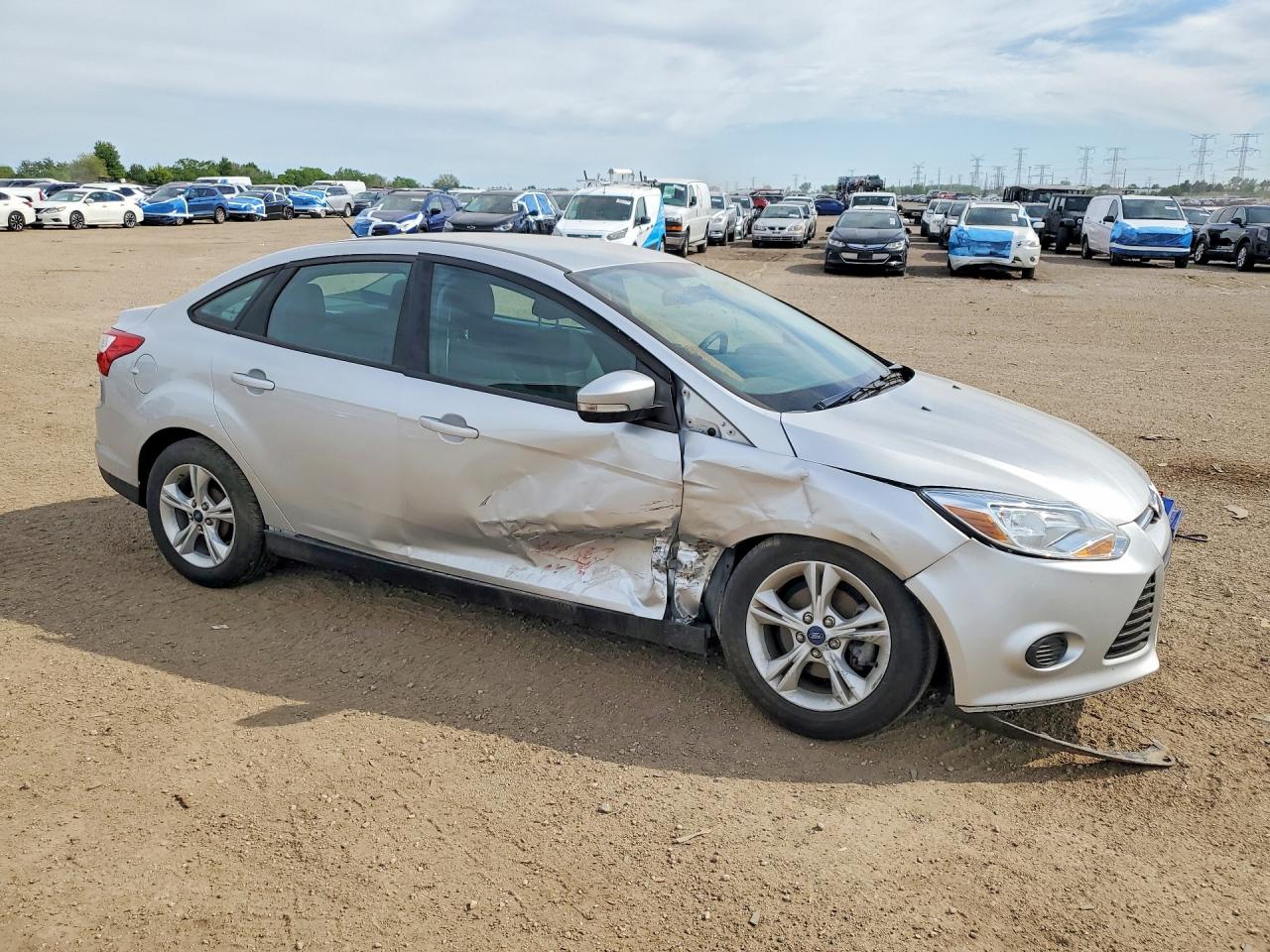 2014 Ford Focus VIN 1FADP3F25EL410991 COPART salvage auction — Side, IL - SALVAGE CERTIFICATE, sold $725 on 2026-06-30 (photo 4)