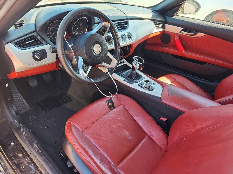 2011 BMW Z4 VIN WBALM5C59BE495940 COPART salvage auction — MINOR DENT/SCRATCHES, Fl - Cert Of Ttl-Rebuilt&Slvg Rbld (P), sold $2,700 on 2026-07-08 (photo 8)