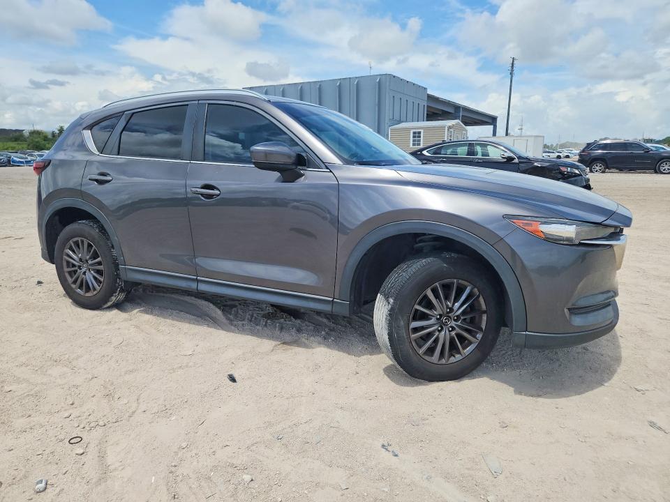 2020 Mazda Cx-5 VIN JM3KFACM7L1863038 COPART salvage auction — SIDE, Fl - Cert Of Title Slvg Rebuildable, sold $6,300 on 2026-07-16 (photo 4)