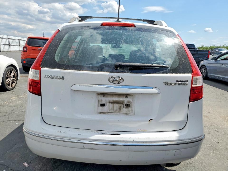2012 Hyundai Elantra VIN KMHDC8AE4CU149070 COPART salvage auction — MINOR DENT/SCRATCHES, Ca - Dis/Dlr/Exp Only Clean Title, sold $325 on 2026-07-16 (photo 6)