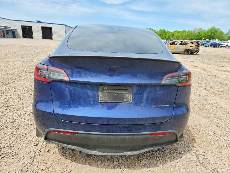 2023 Tesla Model y VIN 7SAYGDEF1PF856893 COPART salvage auction — SIDE, NY - MV-907A SALVAGE CERTIFICATE, sold $13,800 on 2026-07-06 (photo 6)