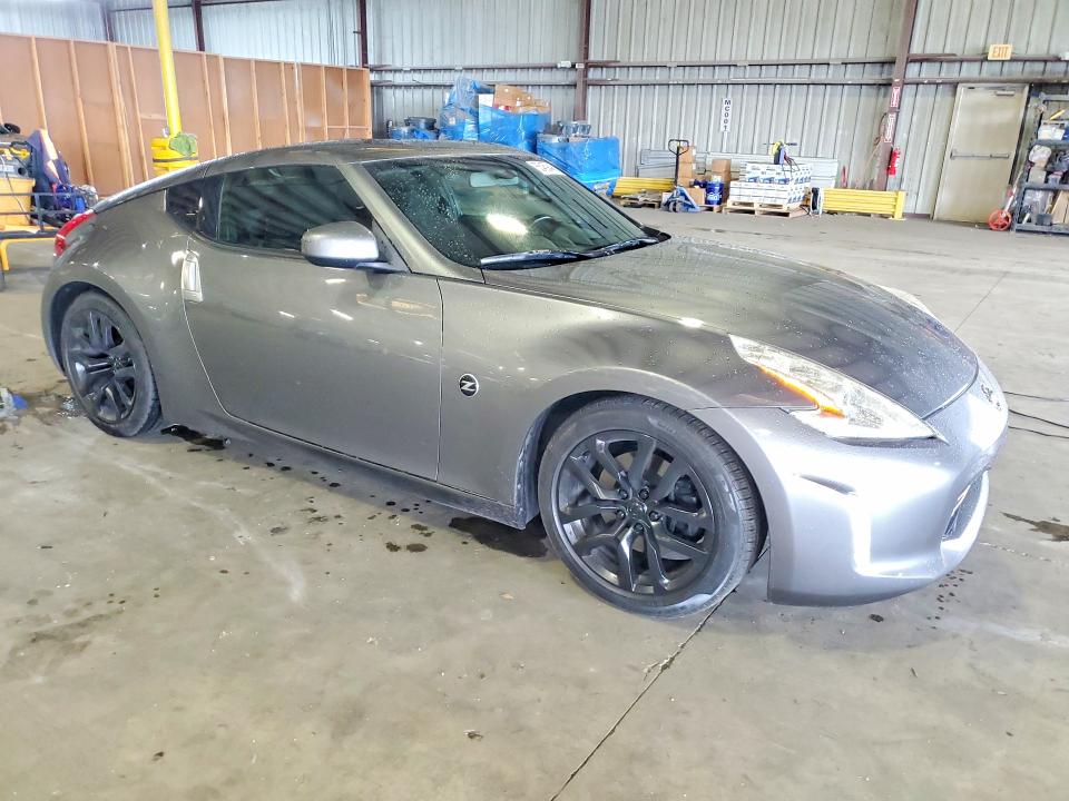 2015 Nissan VIN JN1AZ4EH7FM443976 COPART salvage auction — SIDE, Fl - Cert Of Title Slvg Rebuildable, sold $15 on 2026-07-29 (photo 4)