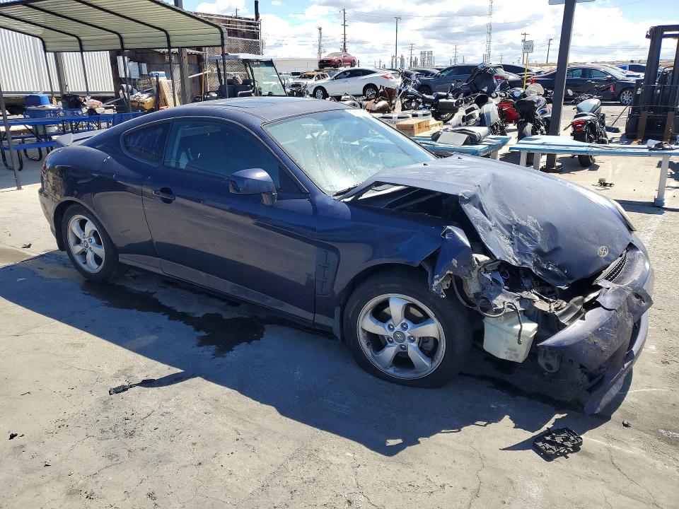 2005 Hyundai Tiburon VIN KMHHM65D95U157351 COPART salvage auction — FRONT END, CA - SALVAGE CERTIFICATE, sold $175 on 2026-07-24 (photo 4)