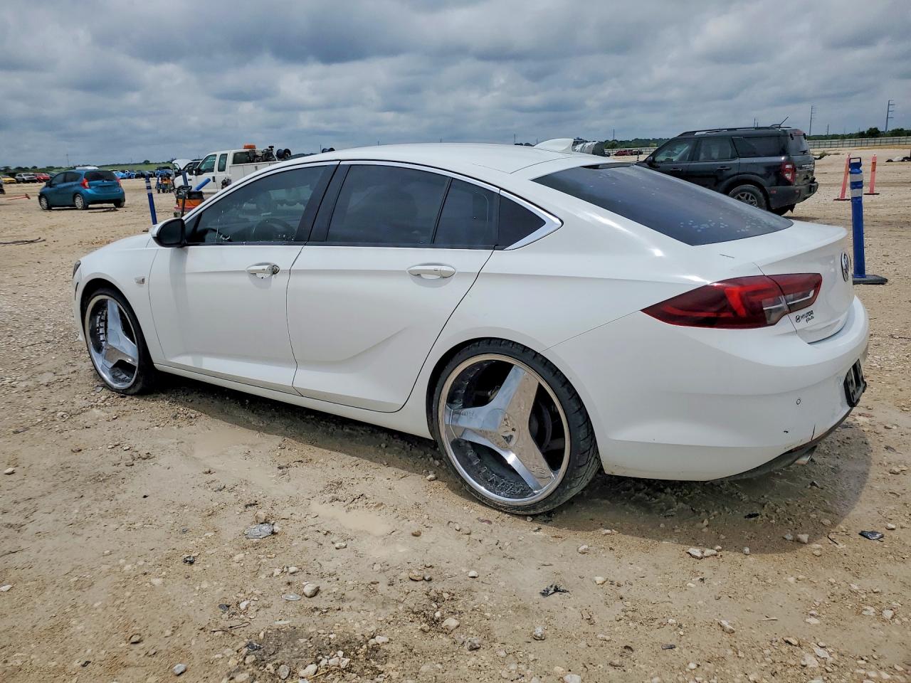 2019 Buick Regal VIN W04GL6SX9K1038806 COPART salvage auction — Side, TX - CERTIFICATE OF TITLE (P), sold $3,900 on 2026-07-08 (photo 2)