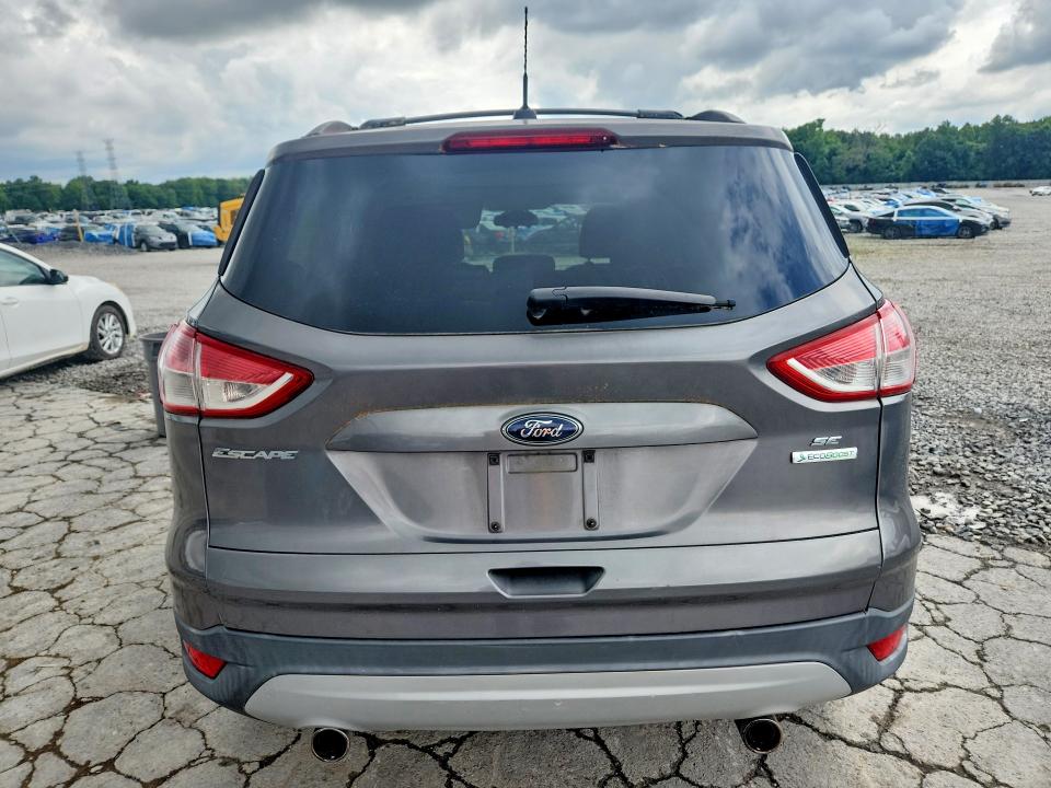 2013 Ford VIN 1FMCU0GX2DUA51613 COPART salvage auction — SIDE, TN - SALVAGE CERTIFICATE, sold $1,500 on 2026-07-02 (photo 6)