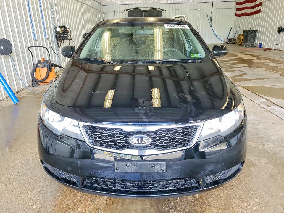 2012 Kia Forte VIN KNAFU4A20C5636427 COPART salvage auction — NORMAL WEAR, Wv - Certificate Of Title (P), sold $925 on 2026-07-19 (photo 5)
