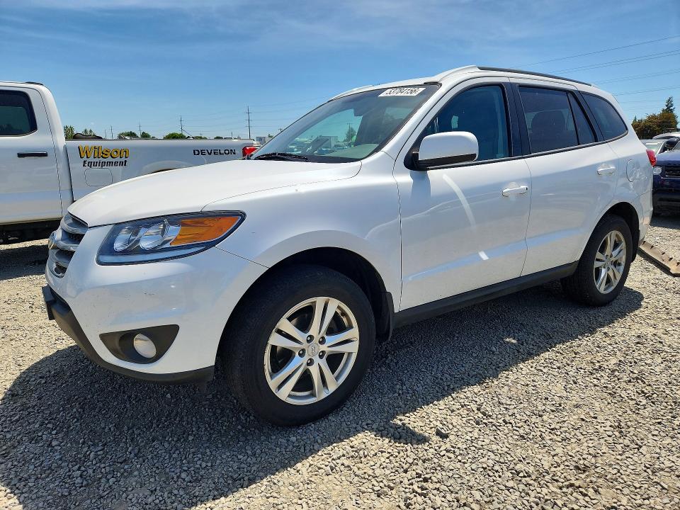 2012 Hyundai Santa fe VIN 5XYZHDAG1CG132346 COPART salvage auction — SIDE, Or - Salvage Title Certificate, sold $775 on 2026-07-07 (photo 1)