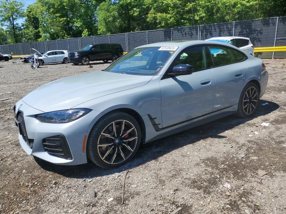 2024 BMW VIN WBY83FB08RFT23652 COPART salvage auction — MINOR DENT/SCRATCHES, Salvage Title, sold $23,200 on 2026-07-17 (photo 1)