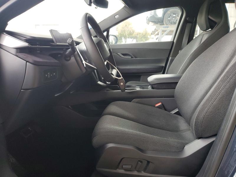 2023 Fisker Ocean VIN VCF1UBU20PG007550 COPART salvage auction — MINOR DENT/SCRATCHES, In - Certificate Of Title, sold $10,900 on 2026-08-13 (photo 7)