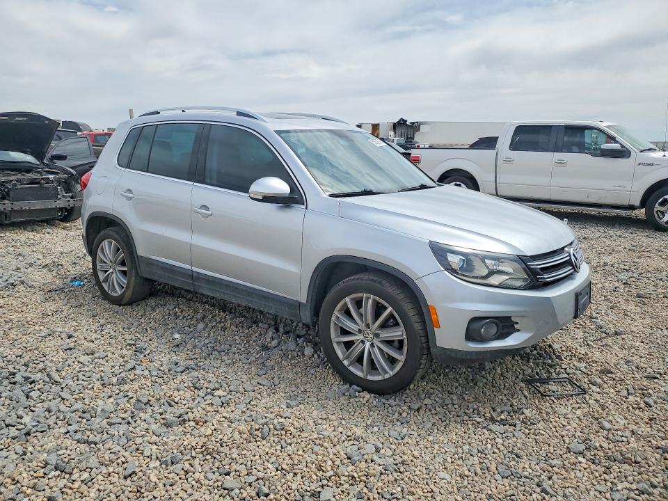 2016 Volkswagen VIN WVGAV7AX2GW606364 COPART salvage auction — SIDE, Tx - Salvage Vehicle Title, sold $1,800 on 2026-07-14 (photo 4)