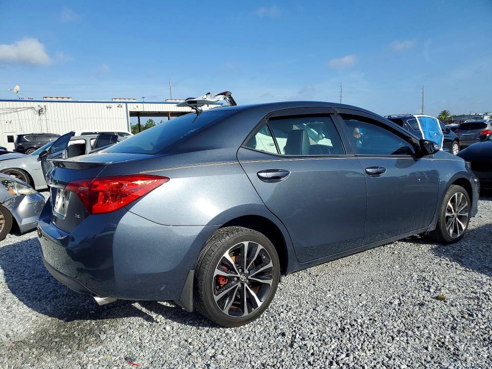 2018 Toyota Corolla VIN 5YFBURHEXJP842546 COPART salvage auction — SIDE, Fl - Cert Of Title Slvg Rebuildable, sold $3,250 on 2026-07-17 (photo 3)