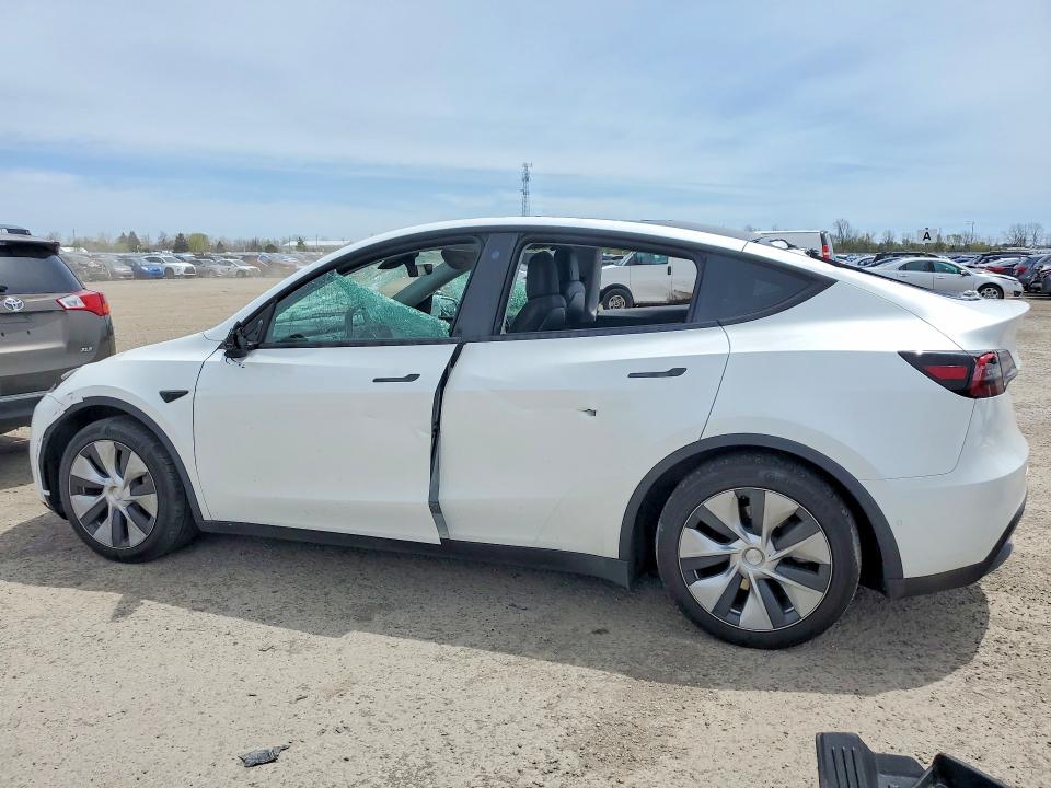 2023 Tesla Model y VIN 7SAYGAEE8PF583103 COPART salvage auction — VANDALISM, On - Permit No Brand - Unfit, sold $15,300 on 2026-07-03 (photo 2)