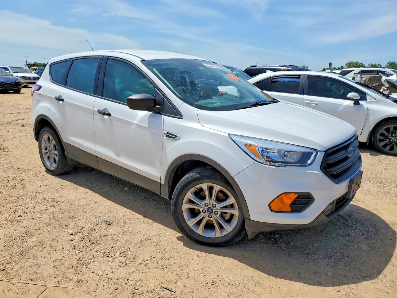 2017 Ford Escape VIN 1FMCU0F70HUD10316 COPART salvage auction — Side, TX - SALVAGE VEHICLE TITLE, sold $1,150 on 2026-07-09 (photo 4)